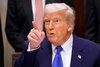 Mark Schiefelbein/AP/dpa | Die deutsche Gründerbranche setzt auf ausländische Talente - und die USA, wo Donald Trump für Turbulenzen sorgt (Archivbild).