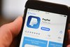 Felix Kästle/dpa | Um Paypals virtuelle Geldbörse nutzen zu können, müssen die Nutzer die neuste Version der Paypal-App auf ihrem Telefon installiert haben.
